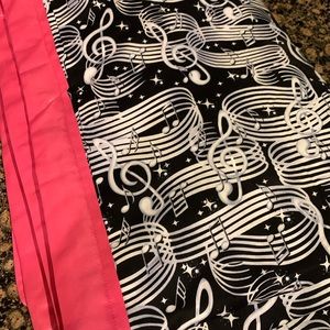 A beautiful musician’s quilt in black white and pink.